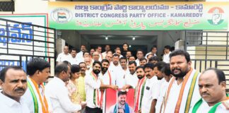 Milk Abhishekam Performed for Portraits of CM and PCC President